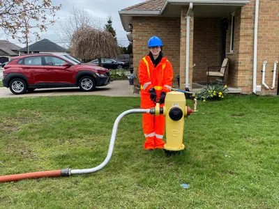 Person beside fire hydrant